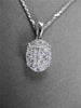 ESTATE .40CT DIAMOND 18KT WHITE GOLD FLOATING CLUSTER FILIGREE OVAL PENDANT