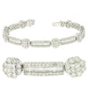 6.65CT DIAMOND 14KT WHITE GOLD ROUND BAGUETTE & PRINCESS FLOWER TENNIS BRACELET
