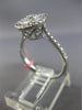 WIDE .71CT ROUND & BAGUETTE DIAMOND 18KT WHITE GOLD 3D OVAL CLUSTER PROMISE RING