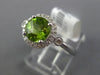 ESTATE 1.51CT DIAMOND & PERIDOT 14KT WHITE GOLD 3D ROUND HALO FRIEDNSHIP RING