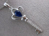 ESTATE .45CT DIAMOND & SAPPHIRE 14KT WHITE GOLD KEY TO MY HEART FLOATING PENDANT