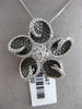 ESTATE LARGE 1.0CT DIAMOND 18KT WHITE & BLACK GOLD FLOWER STAR FLOATING PENDANT