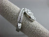 ESTATE LARGE .95CT ROUND BAGUETTE & MARQUISE DIAMOND 18KT WHITE GOLD 3D FUN RING