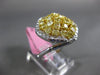 LARGE 3CT WHITE & FANCY YELLOW DIAMOND 18KT 2 TONE GOLD INFINITY LOVE KNOT RING