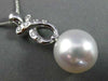 ESTATE LARGE .13CT DIAMOND & SOUTH SEA PEARL 18K WHITE GOLD 3D LOVE KNOT PENDANT