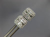 .54CT DIAMOND 18KT WHITE GOLD 3D ROUND & BAGUETTE CLUSTER SQUARE STUD EARRINGS