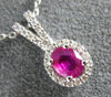 ESTATE .5CT DIAMOND & AAA RUBY 14K WHITE GOLD CLASSIC OVAL HALO FLOATING PENDANT