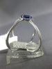 ESTATE LARGE .78CT DIAMOND & AAA SAPPHIRE 14KT WHITE GOLD HALO CRISS CROSS RING