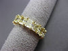 ESTATE LARGE 7.50CT FANCY DIAMOND 18KT YELLOW GOLD EMERALD CUT ETERNITY RING