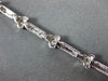 ESTATE .33CT DIAMOND 18KT WHITE GOLD 3D ETOILE TRIANGULAR LOVE TENNIS BRACELET