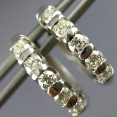 ESTATE .80CT DIAMOND 18KT WHITE GOLD CHANNEL 5 STONE ROUND HUGGIE HOOP EARRINGS