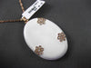 ESTATE LARGE .45CT DIAMOND & WHITE ENAMEL 14KT ROSE GOLD ETOILE FLOWER PENDANT