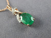 ESTATE .86CT DIAMOND & AAA EMERALD 14KT ROSE GOLD 3D CLASSIC LOVE KNOT PENDANT