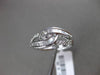 ESTATE WIDE .34CT BAGUETTE & ROUND DIAMOND 18KT WHITE GOLD 3D INFINITY LOVE RING