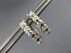 ESTATE .80CT DIAMOND 18KT WHITE GOLD CHANNEL 5 STONE ROUND HUGGIE HOOP EARRINGS