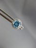 ESTATE 1.17CT DIAMOND & AAA BLUE TOPAZ 14KT WHITE GOLD ROUND HALO STUD EARRINGS