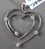 ESTATE LARGE .28CT DIAMOND 14KT WHITE GOLD DOUBLE HEART ETOILE FLOATING PENDANT