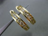 ESTATE 1.03CT DIAMOND 14KT YELLOW GOLD CLASSIC CHANNEL ELONGATED HUGGIE EARRINGS