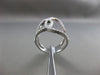 ESTATE EXTRA LARGE .57CT DIAMOND 18KT WHITE GOLD LOVE KNOT MUSICAL NOTE FUN RING
