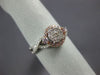 ESTATE .54CT WHITE & PINK DIAMOND 14KT WHITE GOLD 3D CLUSTER INFINITY LOVE RING
