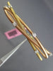 ESTATE .30CT DIAMOND 14KT WHITE & ROSE GOLD CRISS CROSS FLEXIBLE BANGLE BRACELET