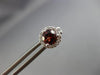 ESTATE 1.17CT DIAMOND & AAA GARNET 14KT WHITE GOLD ROUND HALO STUD EARRINGS