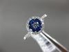 ESTATE .74CT DIAMOND & AAA SAPPHIRE 18KT WHITE GOLD CIRCULAR FLOWER PROMISE RING