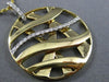 ESTATE LARGE .25CT DIAMOND 18KT WHITE & YELLOW GOLD CIRCULAR CRISS CROSS PENDANT