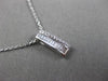 ESTATE .20CT BAGUTTE & ROUND DIAMOND 14K WHITE GOLD RECTANGULAR FLOATING PENDANT