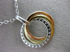 LARGE .57CT DIAMOND 18KT TRI COLOR 3D GOLD CIRCLE OF LIFE INTERTWINING PENDANT