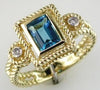 ESTATE 1.23CT DIAMOND & AAA BLUE TOPAZ 14KT YELLOW GOLD EMERALD CUT & ROUND RING