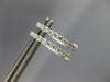 ESTATE .25CT DIAMOND 14KT WHITE GOLD 3D CLASSIC OVAL HUGGIE HOOP EARRINGS