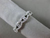 ESTATE .86CT DIAMOND 18KT WHITE GOLD 3D 9 STONE 3/4TH ETERNITY ANNIVERSARY RING