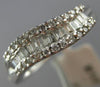 ESTATE .32CT ROUND & BAGUETTE DIAMOND 14K WHITE GOLD SWIRL WAVE ANNIVERSARY RING