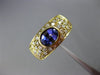 ESTATE WIDE 2.10CT DIAMOND & AAA TANZANITE 18KT YELLOW GOLD 3D ETOILE BEZEL RING