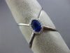ESTATE LARGE .78CT DIAMOND & AAA SAPPHIRE 14KT WHITE GOLD HALO CRISS CROSS RING