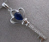 ESTATE .45CT DIAMOND & SAPPHIRE 14KT WHITE GOLD KEY TO MY HEART FLOATING PENDANT