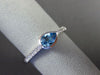 ESTATE .65CT DIAMOND & AAA BLUE TOPAZ 14KT WHITE GOLD PEAR SHAPE BEZEL FUN RING