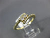 ESTATE .25CT DIAMOND 14K YELLOW GOLD SEMI ETERNITY 2 STONE CRISS CROSS LOVE RING