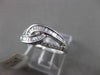 ESTATE WIDE .34CT BAGUETTE & ROUND DIAMOND 18KT WHITE GOLD 3D INFINITY LOVE RING