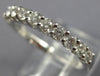 ESTATE .65CT DIAMOND 18KT WHITE GOLD 11 STONE SEMI ETERNITY ANNIVERSARY RING