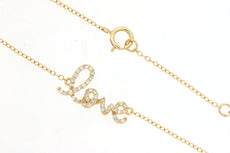 ESTATE .16CT DIAMOND 14KT YELLOW GOLD 3D CLASSIC SCRIPT LOVE NECKLACE