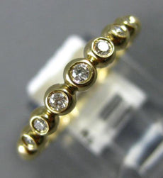 ESTATE .13CT DIAMOND 14KT YELLOW GOLD 3D BEZEL 7 STONE WEDDING ANNIVERSARY RING