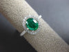 ESTATE WIDE 1.23CT DIAMOND & AAA EMERALD 18KT WHITE GOLD 3D HALO ENGAGEMENT RING