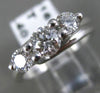 ESTATE .91CT DIAMOND 14KT WHITE GOLD 3D PAST PRESENT FUTURE TENSION RING #14161
