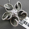 ESTATE LARGE 1.0CT DIAMOND 18KT WHITE & BLACK GOLD FLOWER STAR FLOATING PENDANT