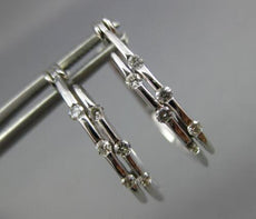 ESTATE .20CT DIAMOND 14KT WHITE GOLD 3D TWO ROW ETOILE OVAL HOOP EARRINGS