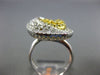 ESTATE LARGE .90CT WHITE & FANCY YELLOW DIAMOND 18KT 2 TONE GOLD LOVE KNOT RING