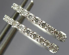 ESTATE .25CT DIAMOND 14KT WHITE GOLD 3D CLASSIC OVAL HUGGIE HOOP EARRINGS