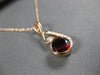 ESTATE 1.08CT DIAMOND & AAA GARNET 14KT ROSE GOLD 3D LOVE KNOT INFINITY PENDANT